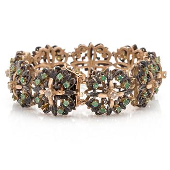 An emerald and rose cut diamond bracelet.