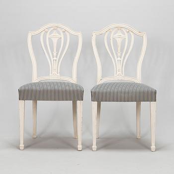 Four George III style chairs, early 20th century.
