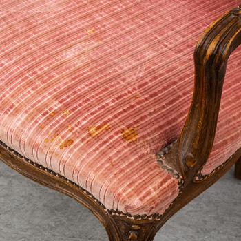 A pair of 19th-century rococo revival arm-chairs.