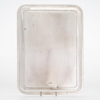 A silver tray, mark of Ovchinnikov with the Imperial warrant. Saint Petersburg, 1908-17.