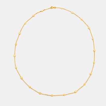 477. Collier 18K guld med runda briljantslipade diamanter.