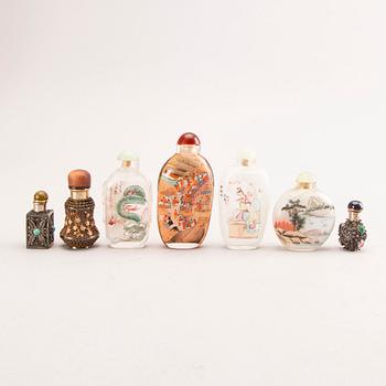 A set of seven different metal and glass snuff bottles 20th century.