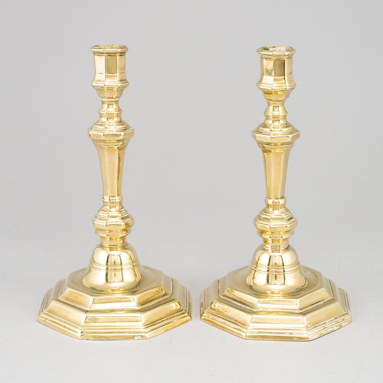 A pair of French bronze candlesticks.