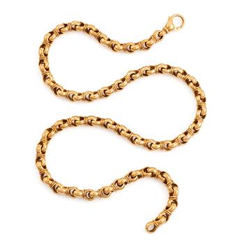 An 18K gold Tännler necklace.