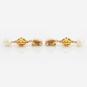 Chanel, a pair on gold tone and pearl clip-on earrings.