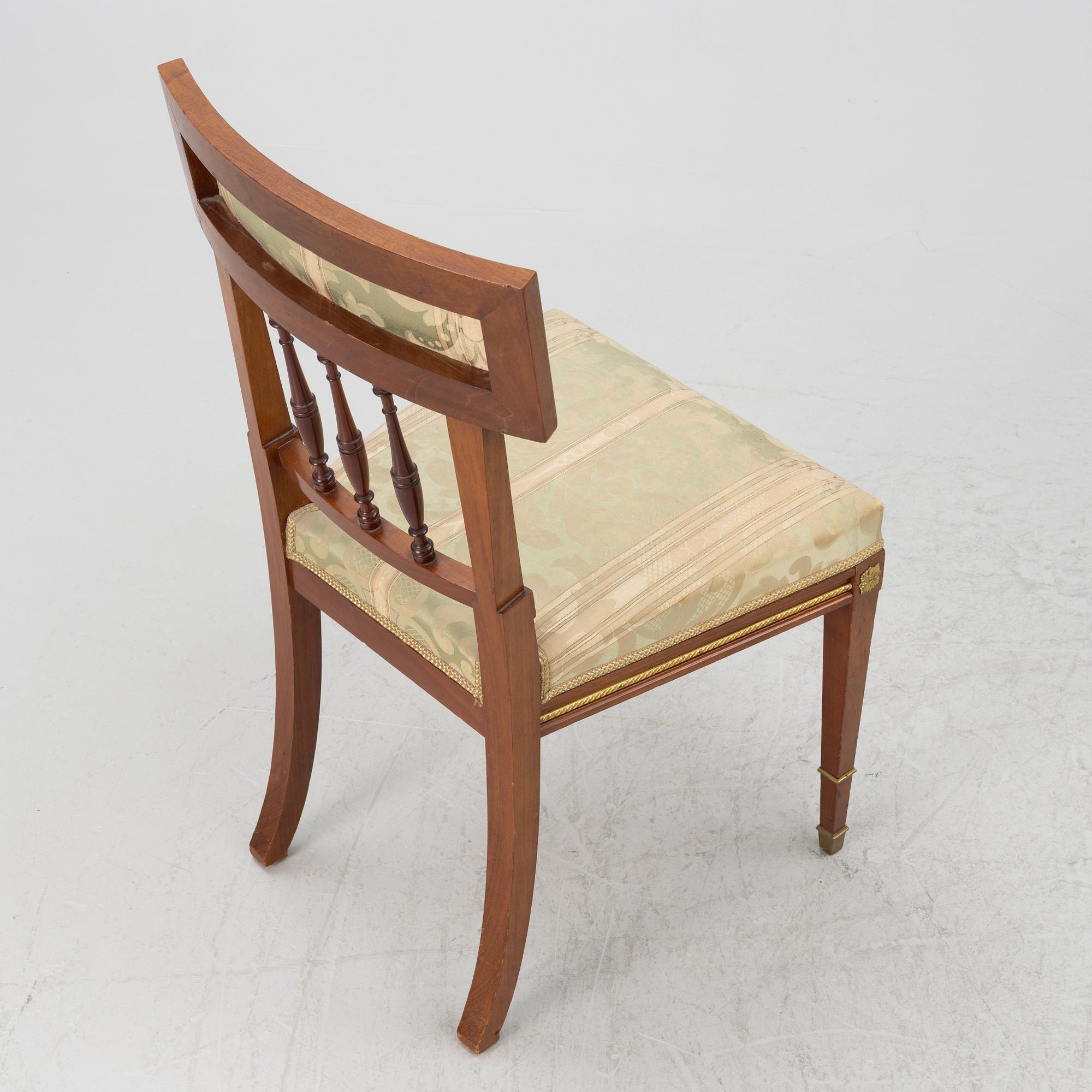 A sofa, two armchairs, four chairs and table, Empire style, 20th century.