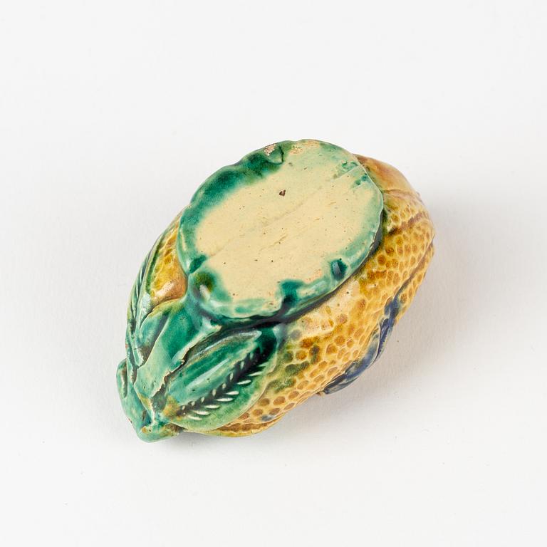 A brushwasher in the shape of a finger lemon, Qing dynasty, circa 1900.