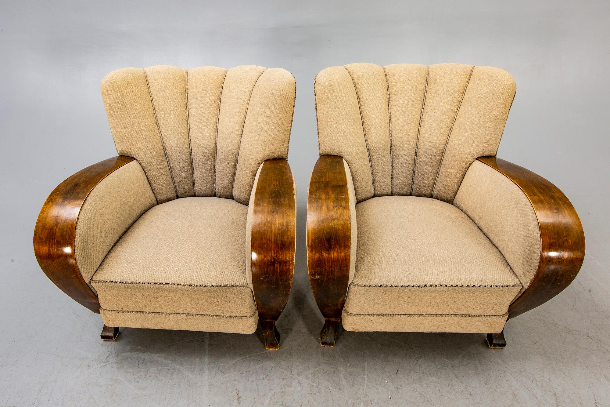 A pair of Art Deco armchairs.