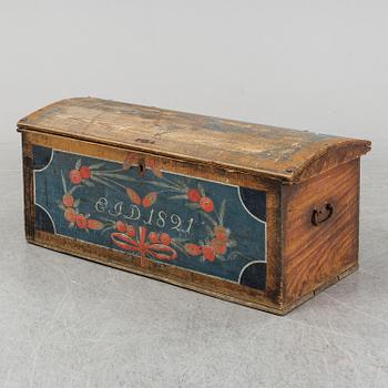 A painted pine chest from Bohuslän, dated 1821.