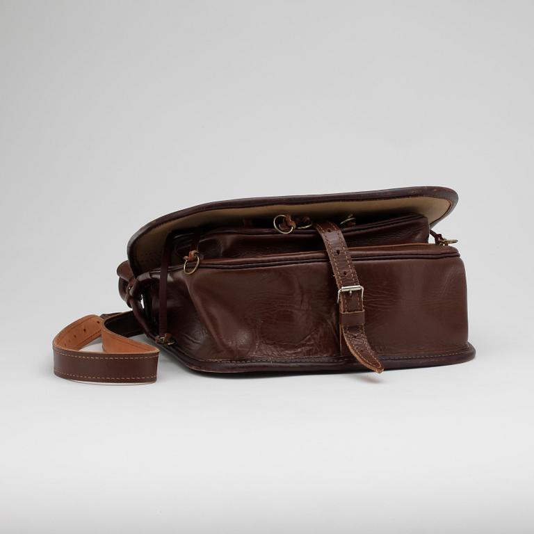 HUNTING BAG, brown leather and seal fur, 1960's.