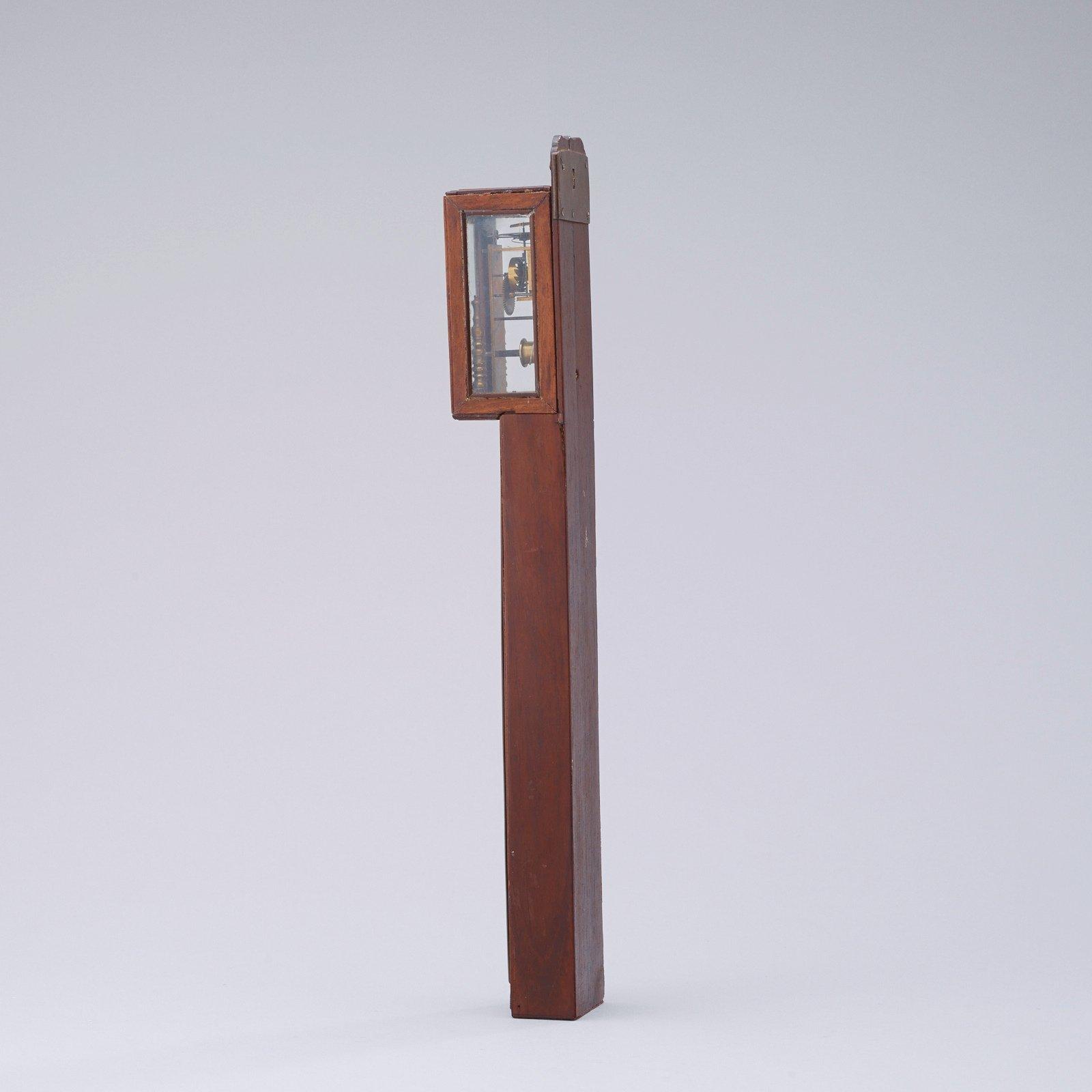 A Japanese 19th century pillarclock.