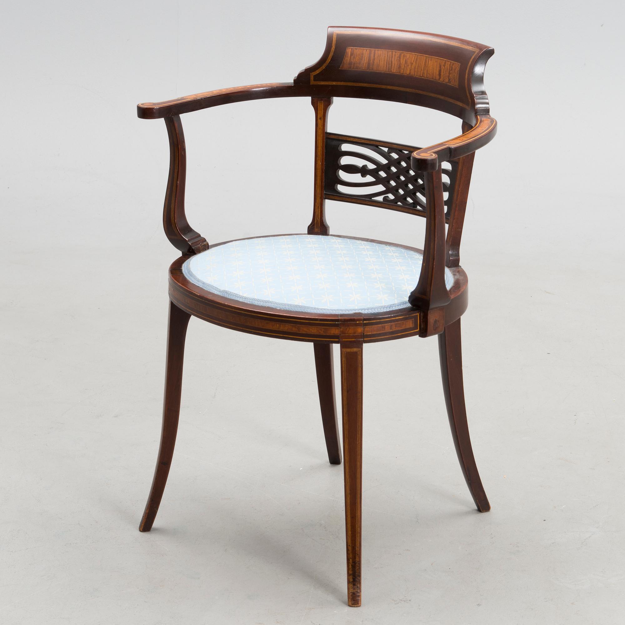 An Edward VII mahogany open armchair, circa 1900.