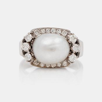 575. A natural saltwater pearl and diamond ring. Total carat weight circa 0.40 ct.