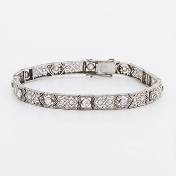 DIAMOND BRACELET, probably platinum, old and rose-cut diamonds approx 2 ct in total, 1 large stone not diamond.