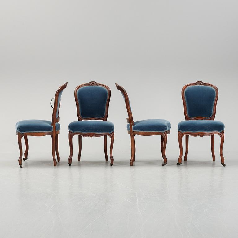 A sofa and a set of four chairs, Rococo revival, late 19th century.