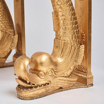 A pair of Swedish Empire carved and giltwood console tables, first half of the 19th century.