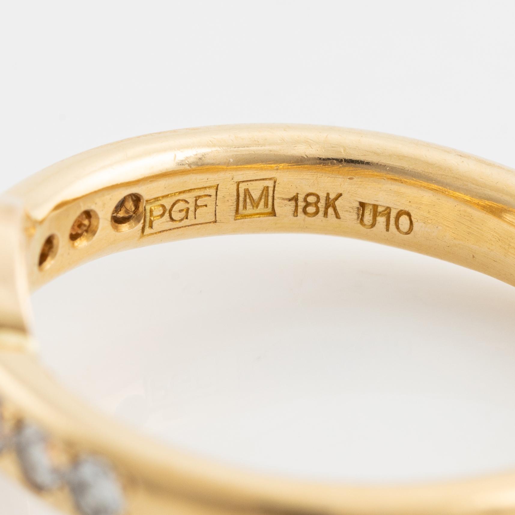 Ring 18K guld med en rund briljantslipad diamant.