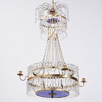 A late-Gustavian five-light gilt brass and cut glass chandelier, Stockholm, late 18th century.