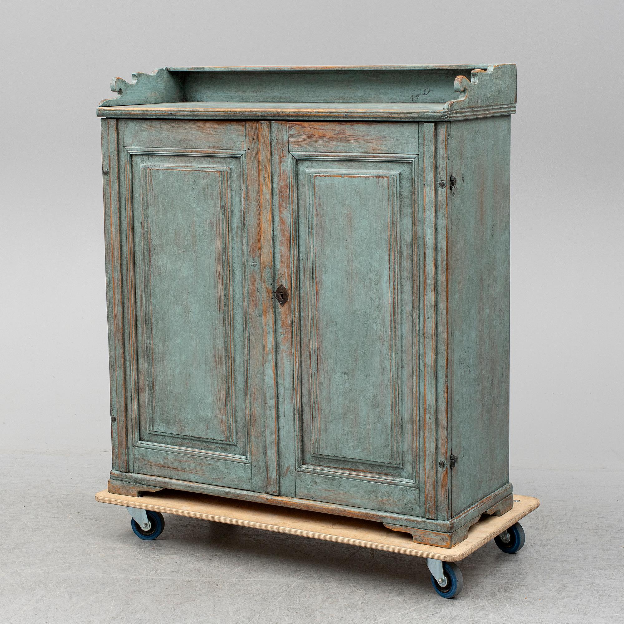 A first half of the 19th century painted cupboard.