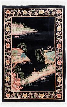 A Chinese rug, c. 183 x 120 cm.