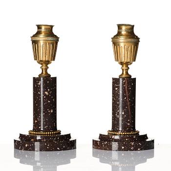 A pair of late Gustavian Swedish porphyry and ormolu cassolettes.