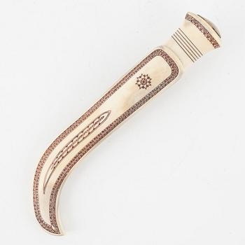 Esse Poggats, a reindeer horn knife, signed and dated 1987.