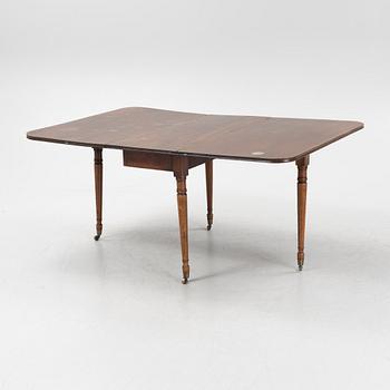 A mahogany dining table, second half of the 19th Century.