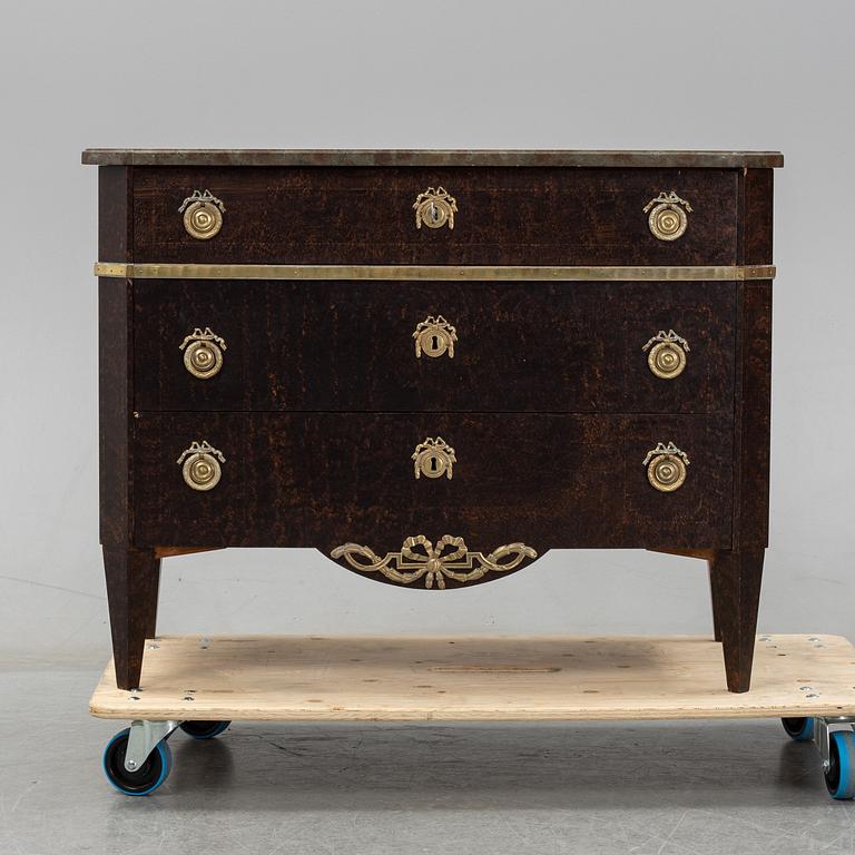 A gustavian style chest of drawers, early 20th century.