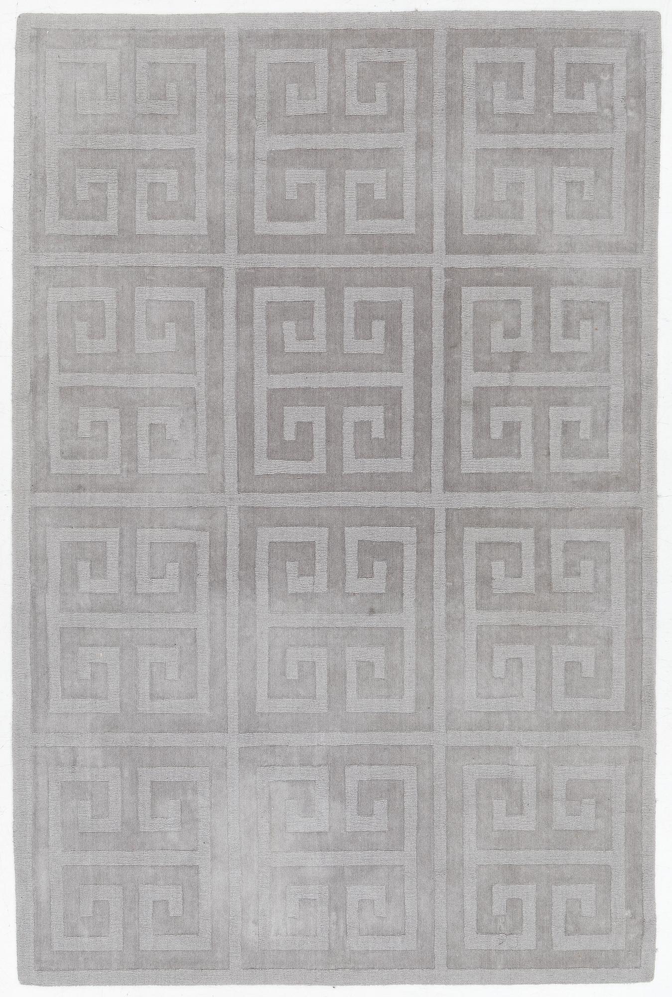 A 'Cubes' carpet, Layered, c. 270 x 180 cm.