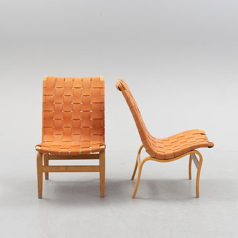 A pair of Bruno Mathsson 'Eva' lounge chairs, by Karl Mathsson, for VÄrnamo, 1965 and 1970.