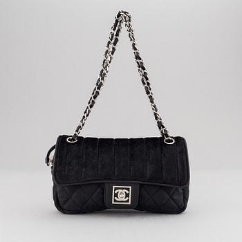 Chanel, a canvas and pony hair handbag, 2005-06.