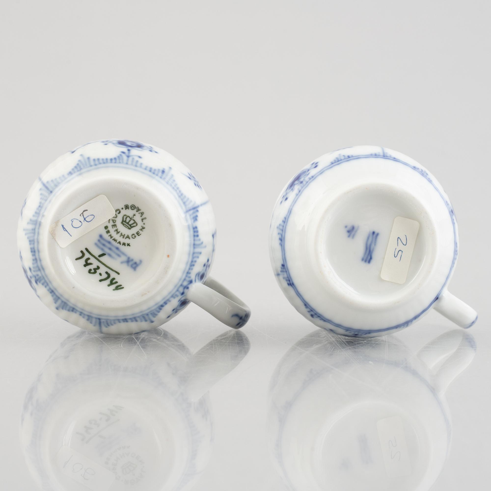 Two 'Blue Fluted' / 'Musselmalet rifflet' porcelain cream cups with covers, Royal Copenhagen, 19th century and 1964.