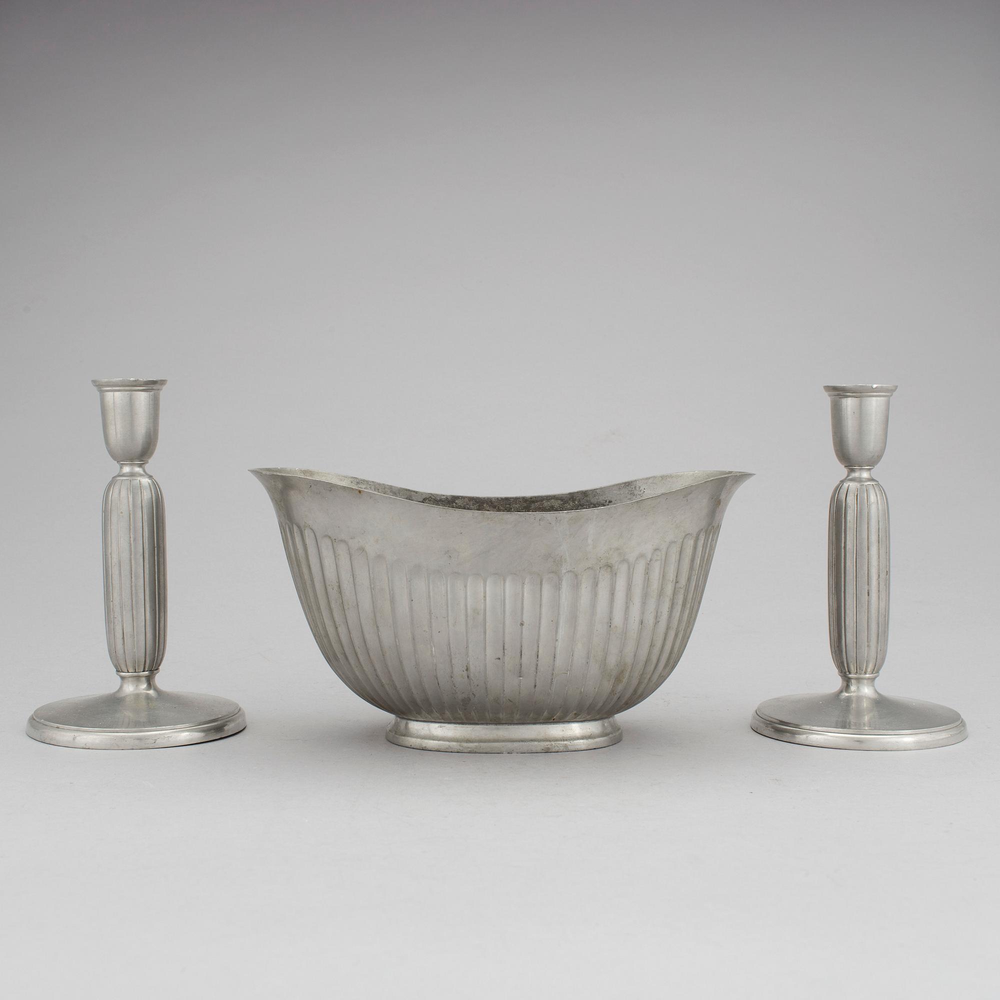 One pewter bowl and a pair of candleholders by Just Andersen, Denmark.