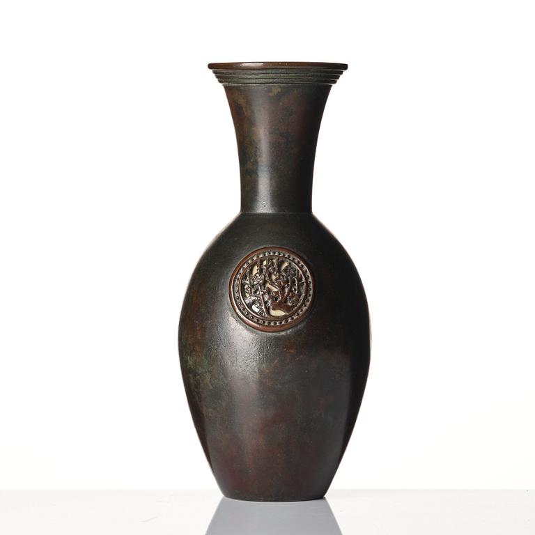A copper alloy vase, circa 1900.