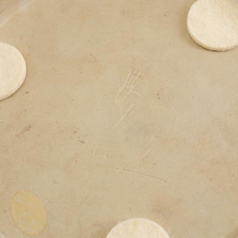 Four mid 20th century dishes by Stig Lindberg for Gustavsberg, two 'Domino', one 'Silur' and one signed.