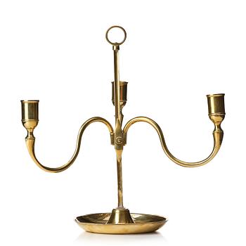 A Gustavian brass three light candelstick.