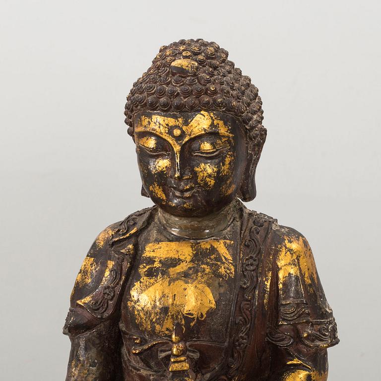 A Ming style gilded bronze Buddha.