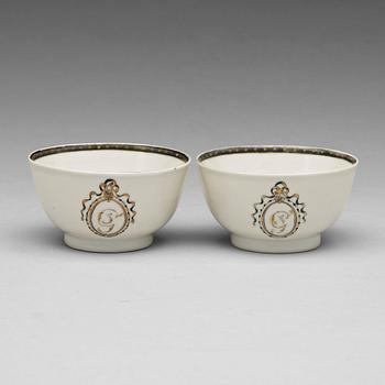 A pair of armorial grisaille cups, Qing dynasty, Qianlong (1736-95).