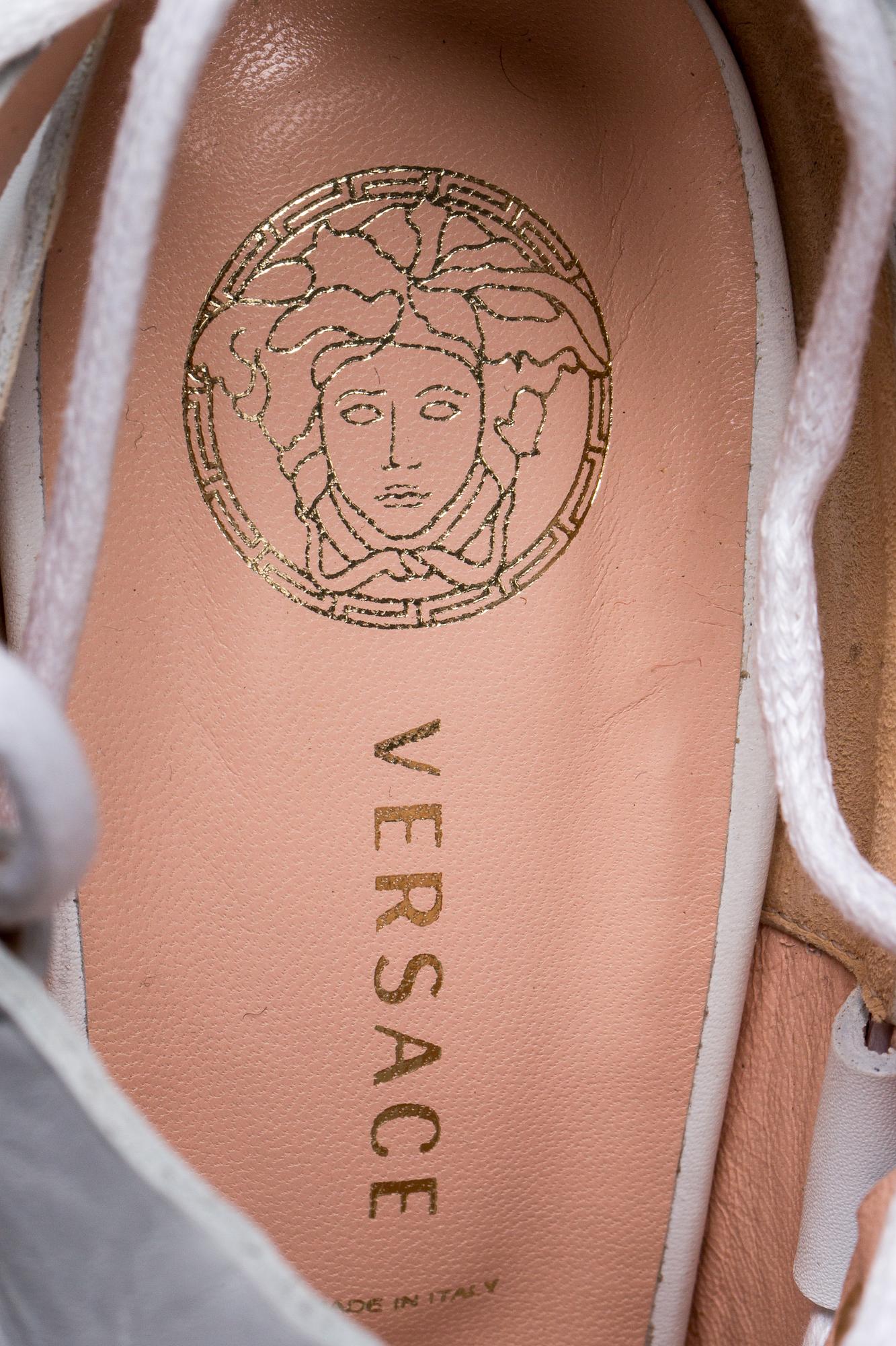 SKOR, Versace.