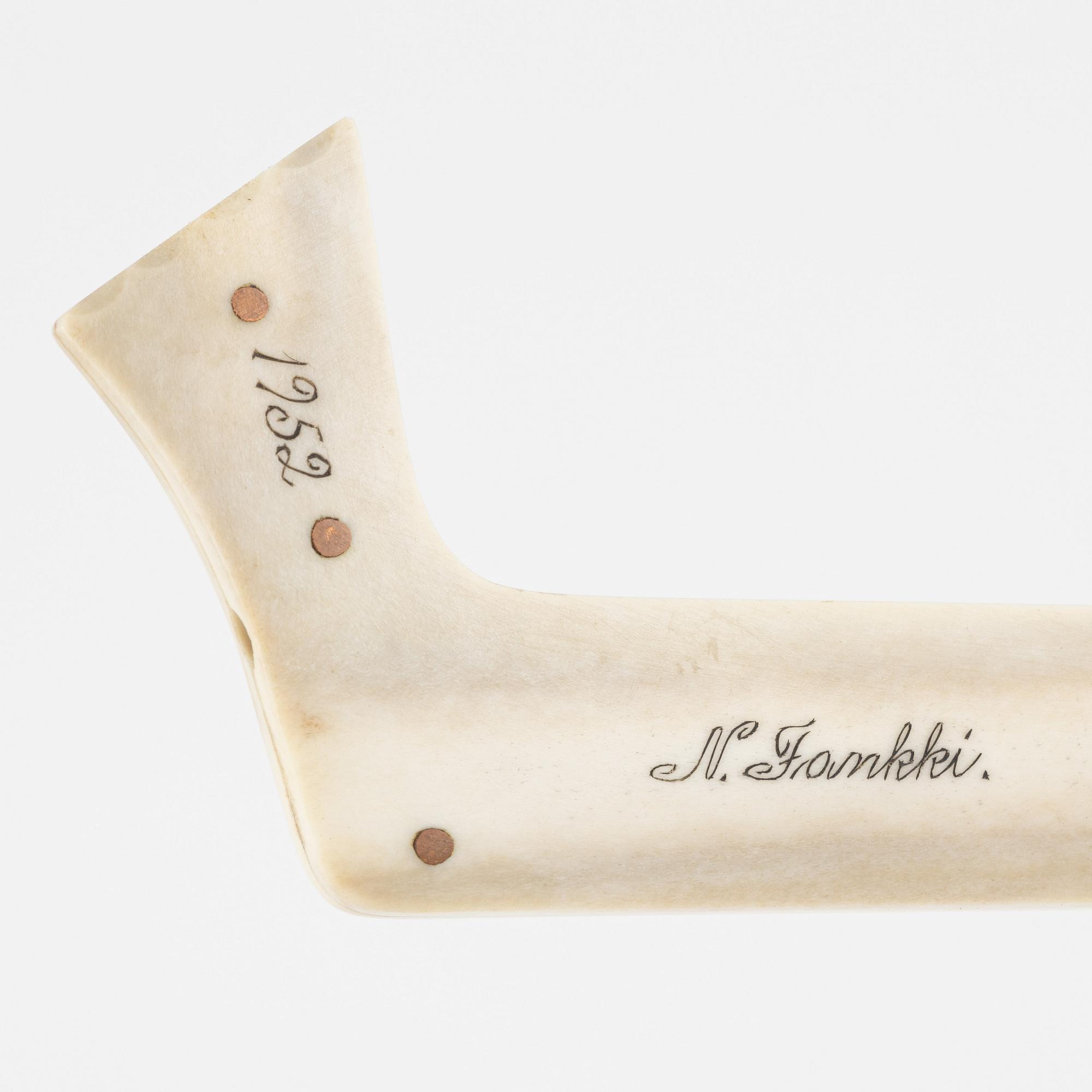 Nikolaus Fankki, a reindeer horn knife, sifned and dated 1952.