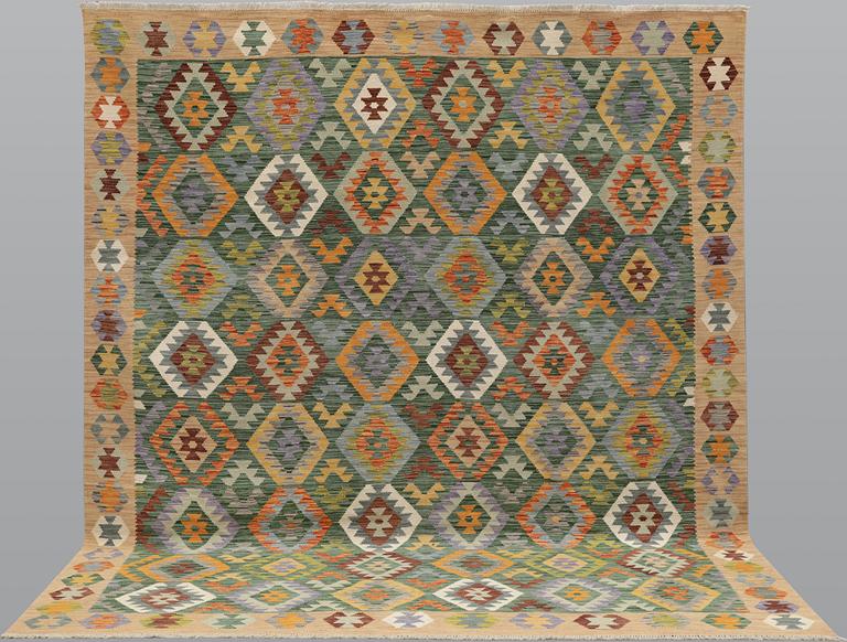 A Kilim carpet, approx. 290 x 250 cm.