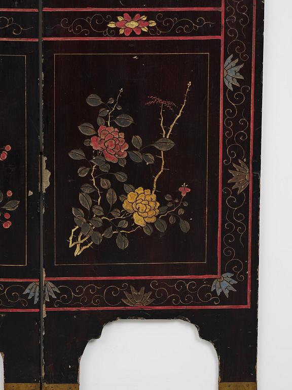 A Chinese four panel lacquer folding screen, first part of the 20th century.