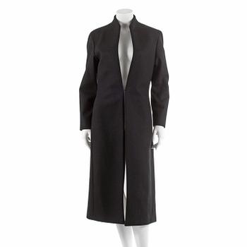 YVES SAINT LAURENT, a black wool coat. French size 46.