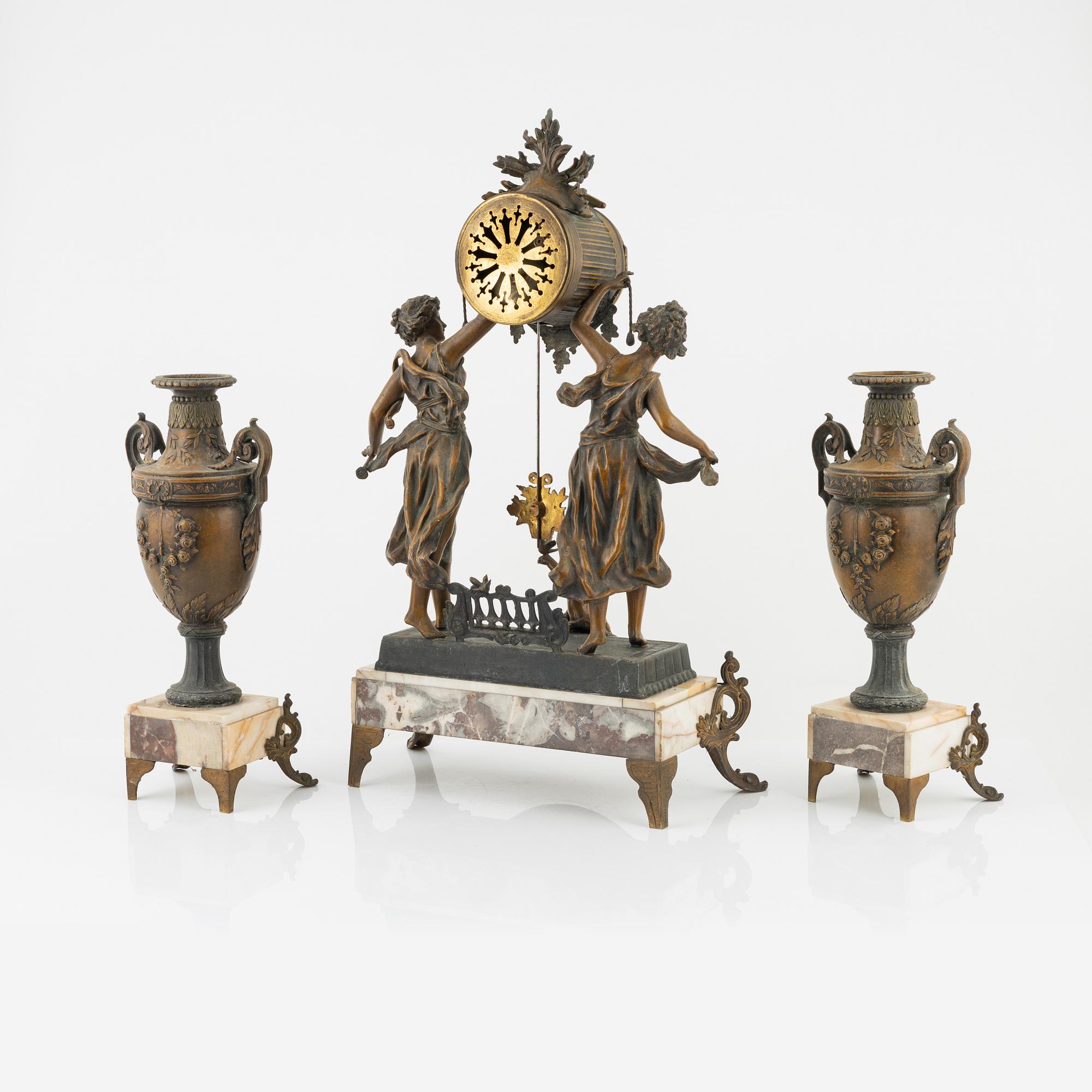 A three-piece mantle set, L. Ferciot, Aix-en-Othe, France, late 19th Century.