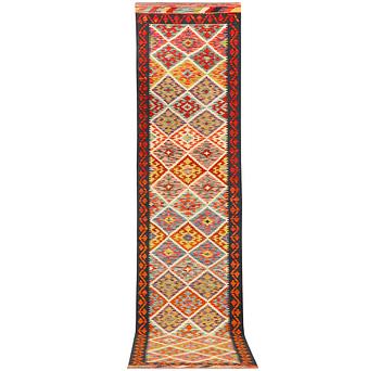 A runner carpet, Kilim, c. 403 x 82 cm.