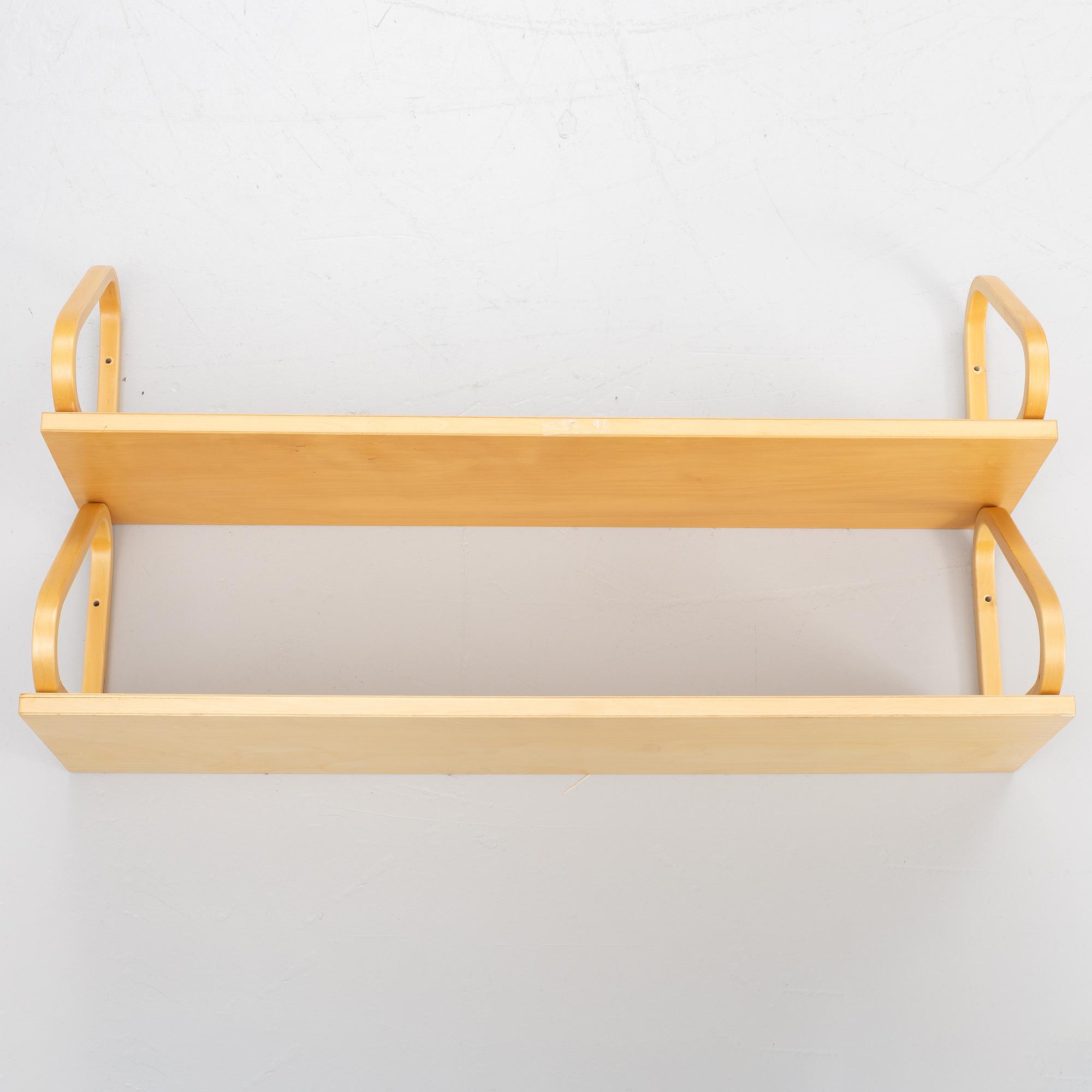 Alvar Aalto, a pair of wall shelves, model 112B, Artek, Finland, late 20th century.