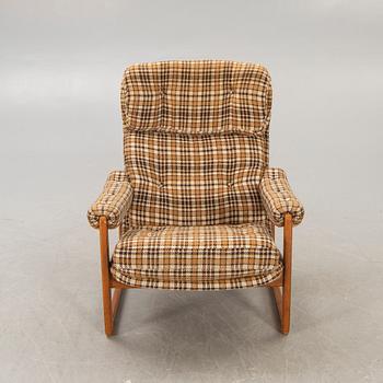 An Inge Andersson walnut "Draken" easy chair late 1960s.