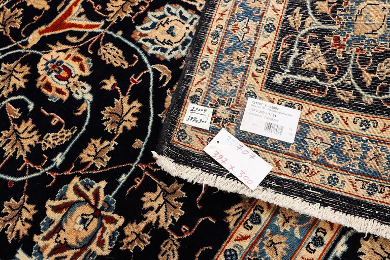 A Kashan carpet, c. 397 x 300 cm.