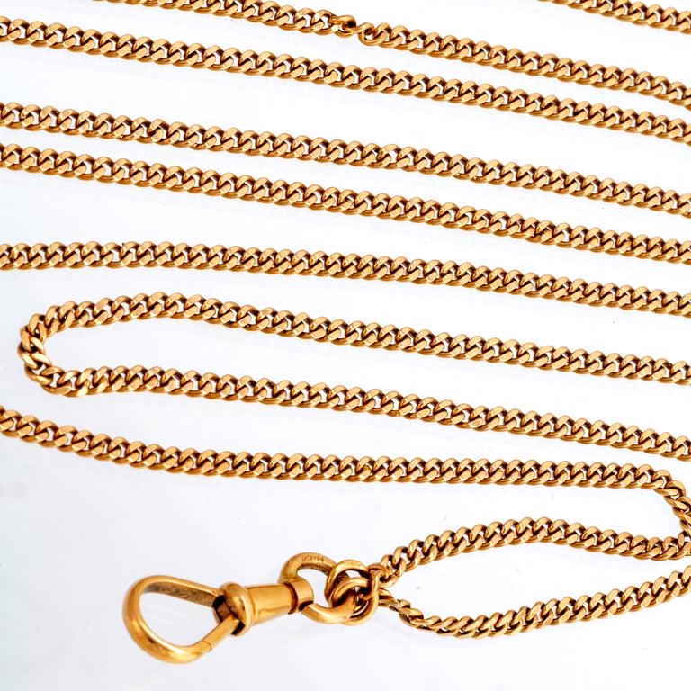 An 18K gold watch chain.