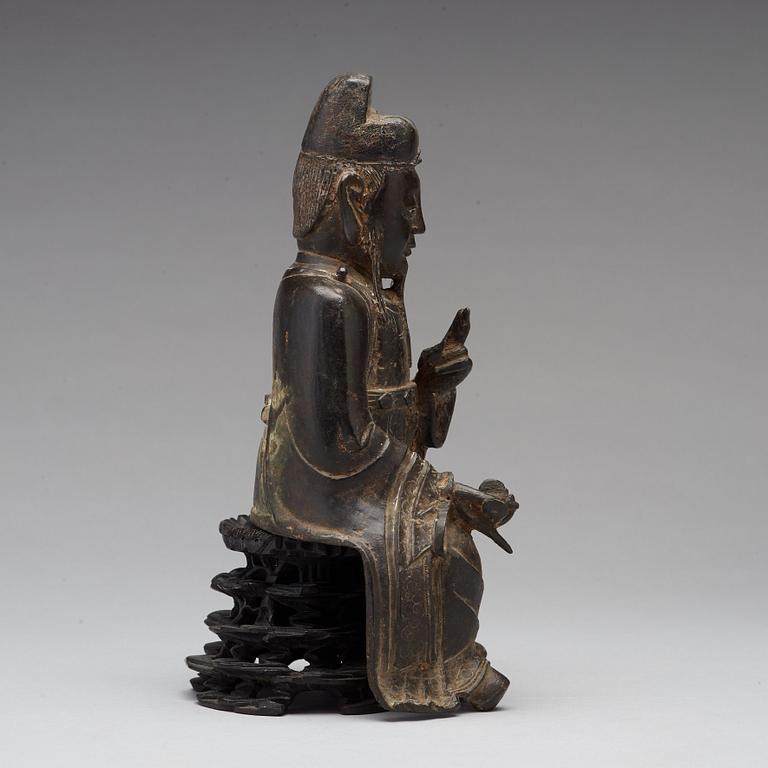 A bronze sculpture of a daoist dignitary, Ming dynasty (1368-1644).